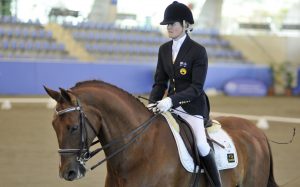 Image of a female athlete on a horse