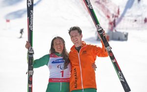 An image of Melissa Perrine and Christian Geiger smiling