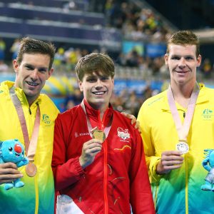 An image of Liam Schluter, Daniel fox and Michael Dodge holding their medals