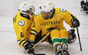 An image of players in a para-ice hockey match