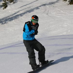 An image of Matt Robinson in action while snow boarding