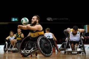 Image of parathletes playing wheelchair rugby