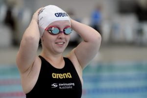 Image of a swimmer smiling in her swimming gear