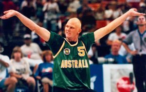 male wheelchair basketball player hands in the air