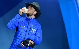 male paralympian kissing gold medal