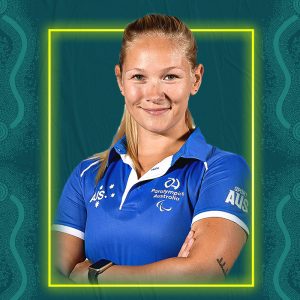 Image containing a dark green background with a yellow border. In the middle is a headshot of Australian para-athlete Vanessa Low looking straight at the camera. She is wearing a blue t-shirt.