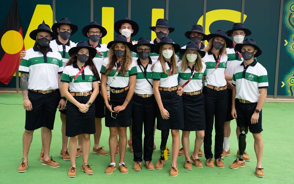 Male and female members of the Australian Para-athletics team wearing their Tokyo 2020 Opening Ceremony uniforms