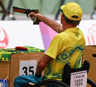 Pitt is back on the range after barely being able to hold a pistol early in the year