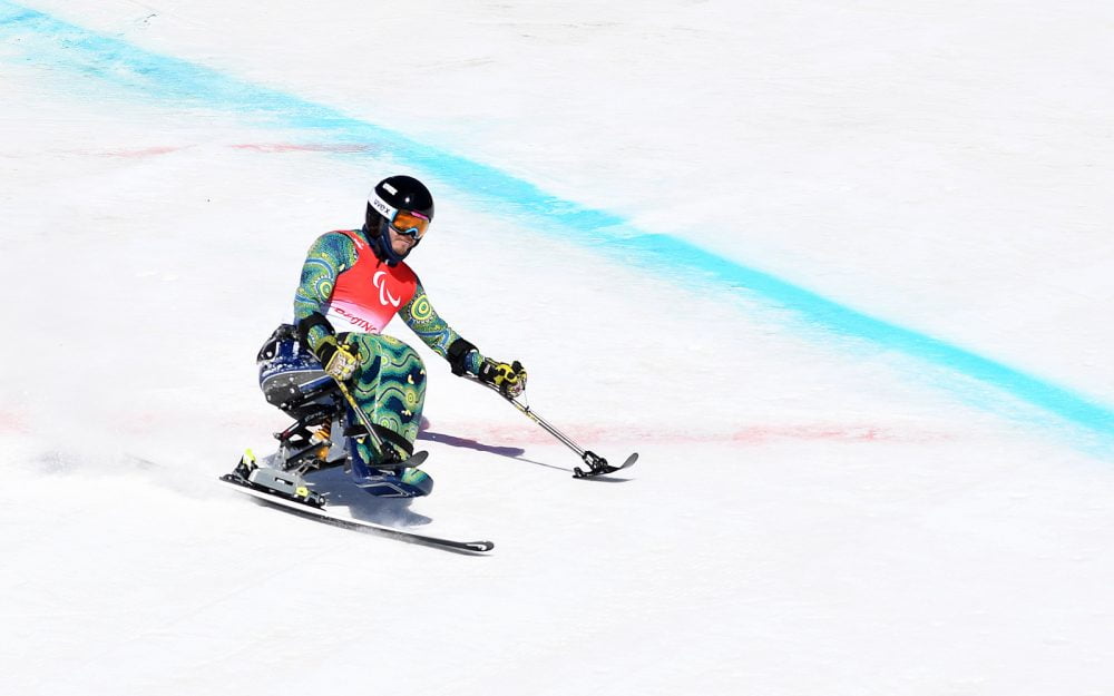 Australian Paralympian Sam Tati sit skiing at the Beijing 2022 Paralympic Winter Games.