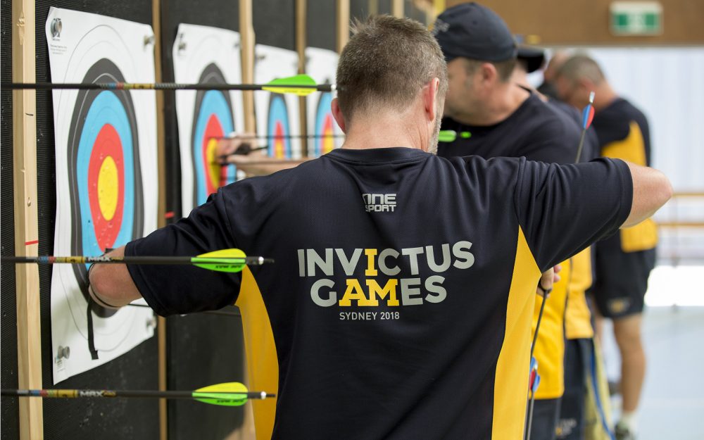 A male participating in archery at the Sydney 2018 Invictus Games