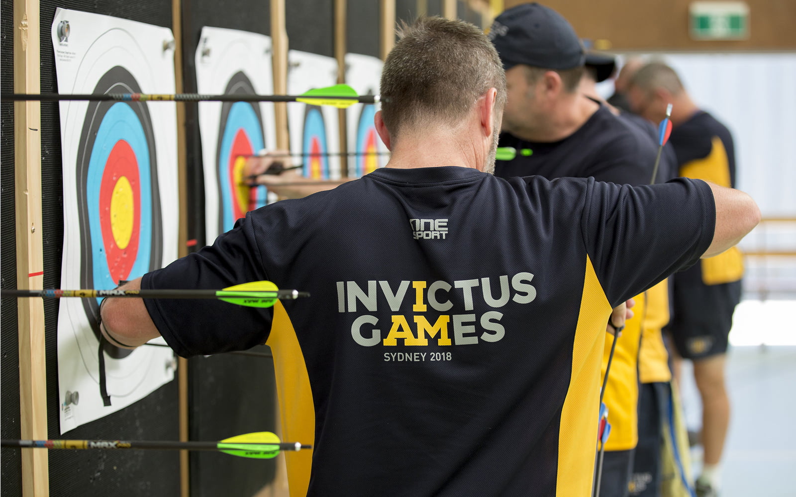 A male participating in archery at the Sydney 2018 Invictus Games