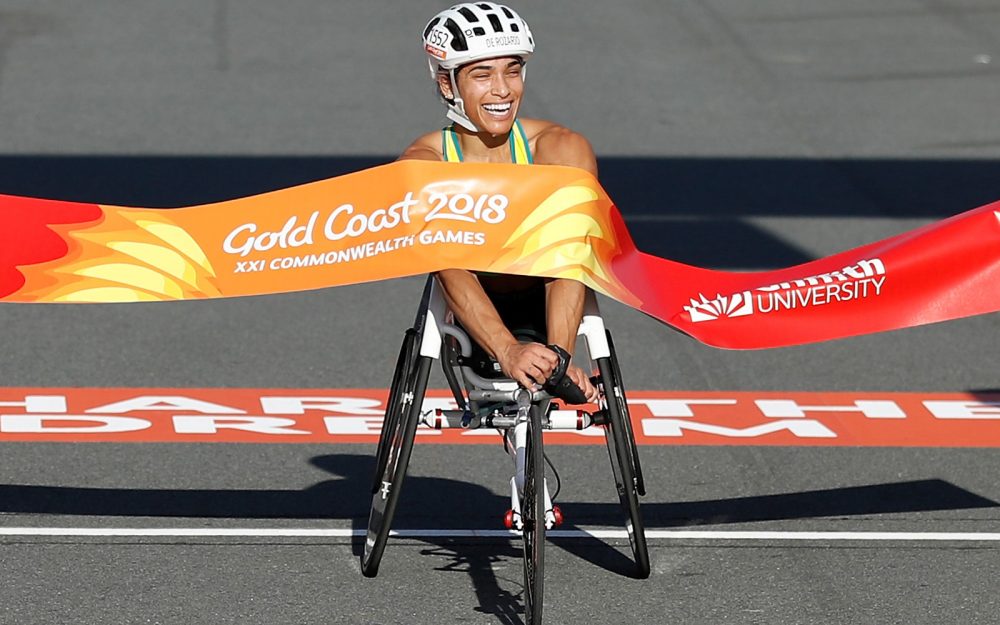 Australian Paralympian Madison de Rozario crosses the finish line