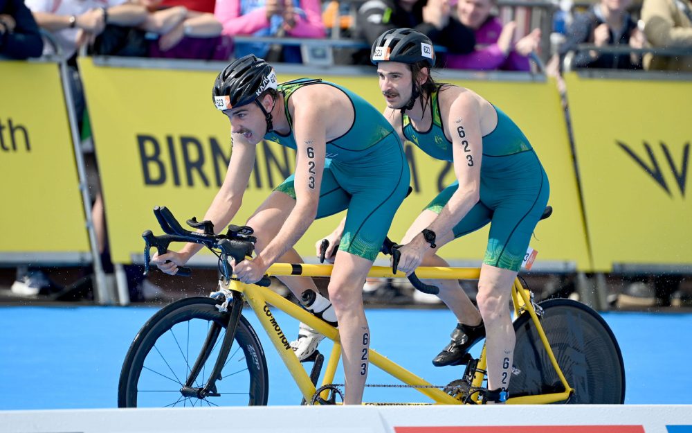 Australian Para-triathletes Sam Harding and guide Luke Harvey on a tandem bike