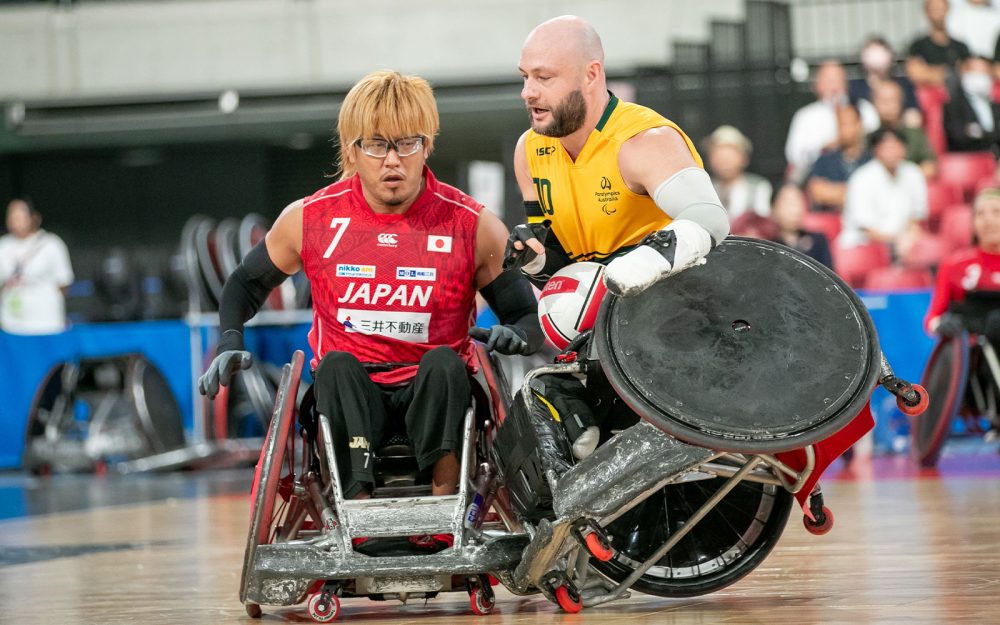 Australian Steelers Wheelchair Rugby captain Chris Bond smashing into his Japanese opponent.