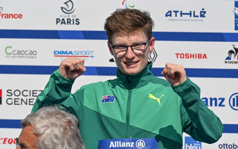 Australian Paralympian Jarryd Clifford smiling and fist pumping.