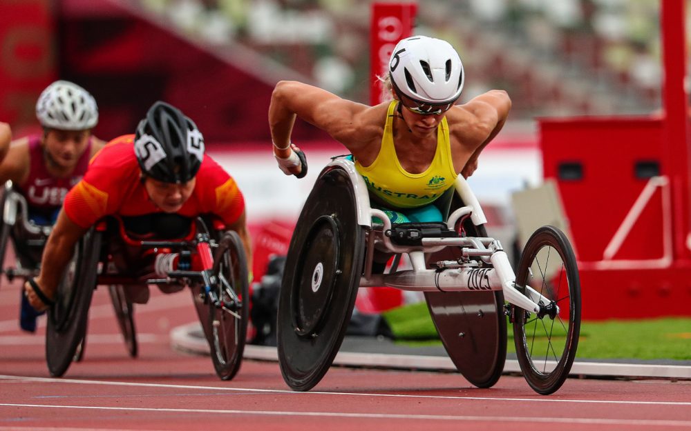 Australian Paralympians Madison de Rozario in a wheelchair race.