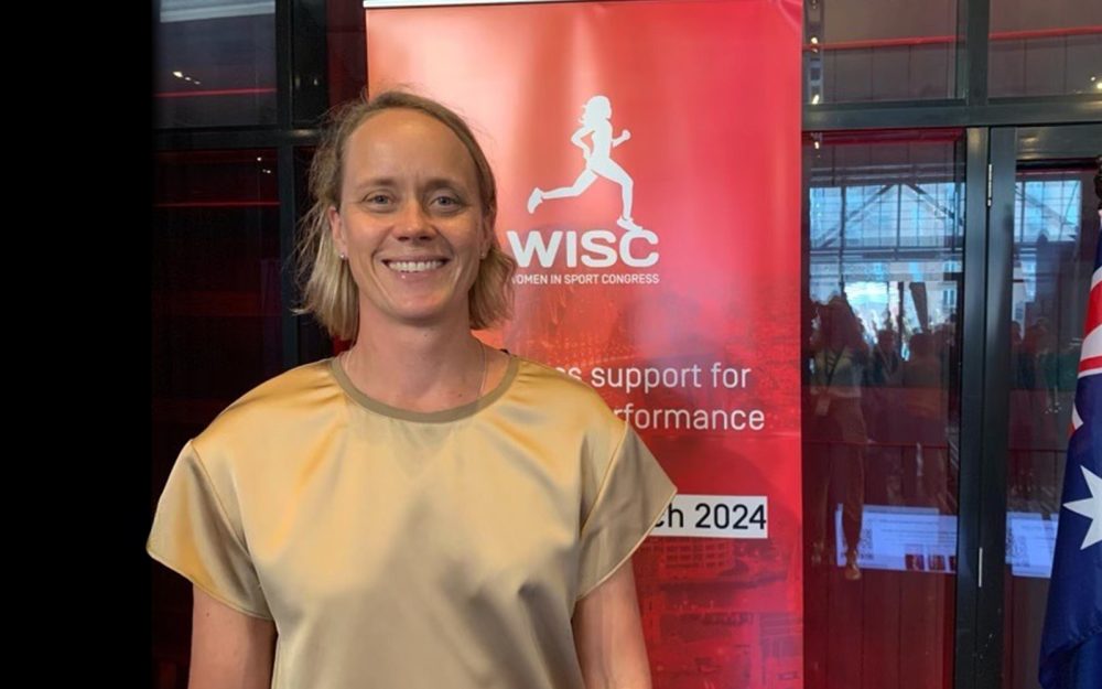 Dr Rachel Harris smiling at camera.