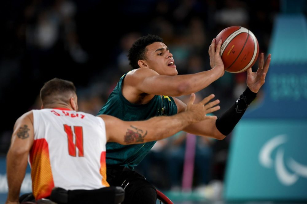 Wheelchair basketballer Jaylen Brown reaches for the ball.
