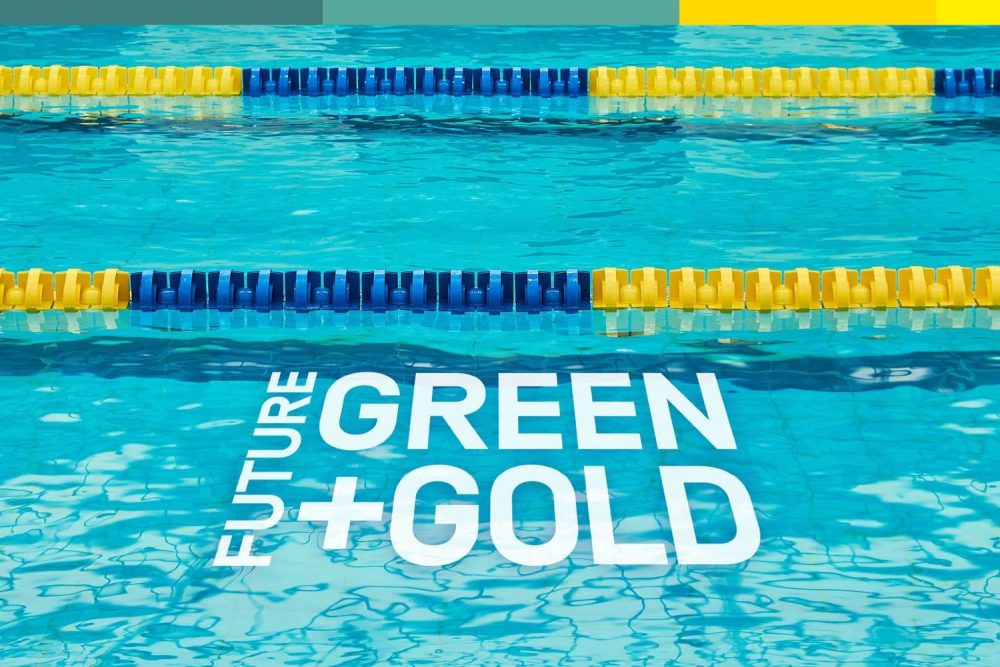 Swimming pool with Future Green & Gold text superimposed on the water