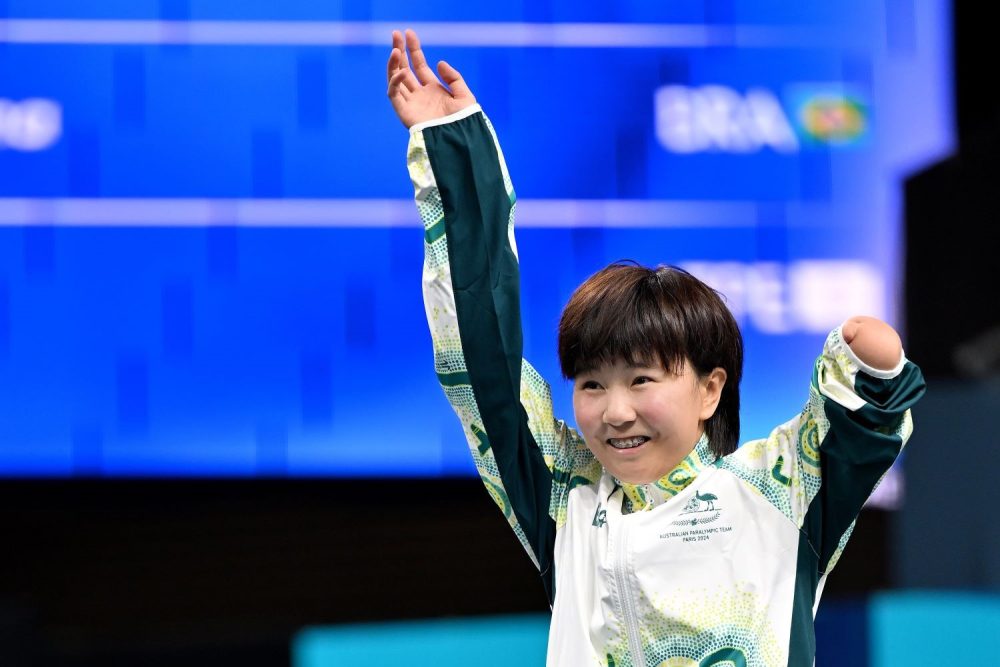Qian Yang celebrates her gold win on Day 7 of the Paris Paralympic Games.
