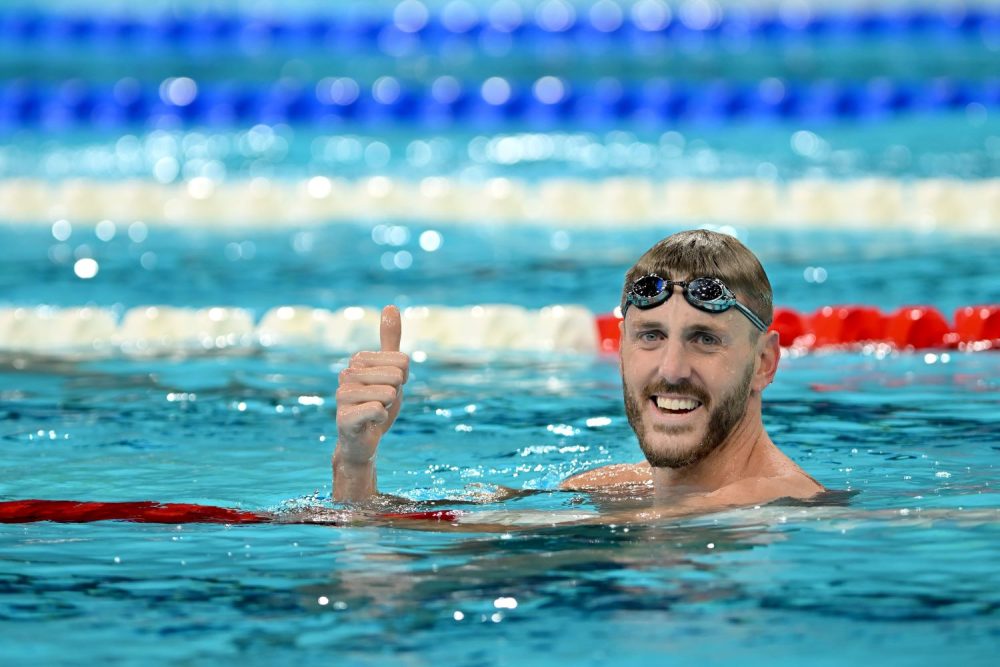 Brenden Hall giving the thumbs up from the end of a pool.
